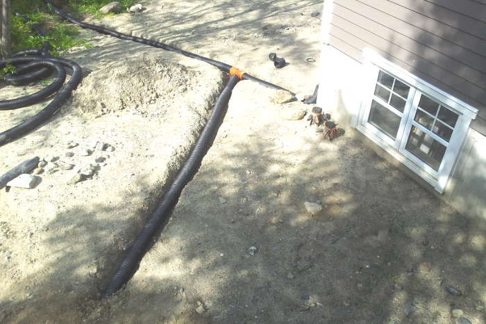 Installation des drains de gouttière
